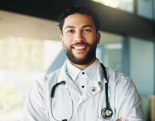 happy-man-portrait-doctor-hospital-with-confidence-healthcare-career-with-service-smile-professional-male-medical-worker-with-pride-job-development-clinic-mexico_590464-549268-ezgif.com-avif-to-jpg-con Dr. Kamran Siddqui