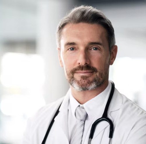 mature-doctor-portrait-man-hospital-healthcare-wellness-career-clinic-face-medical-professional-confident-expert-surgeon-therapist-worker-senior-employee-canada_590464-238731-ezgif.com-avif-to-jpg-conv Dr. Ejaz Ahmed